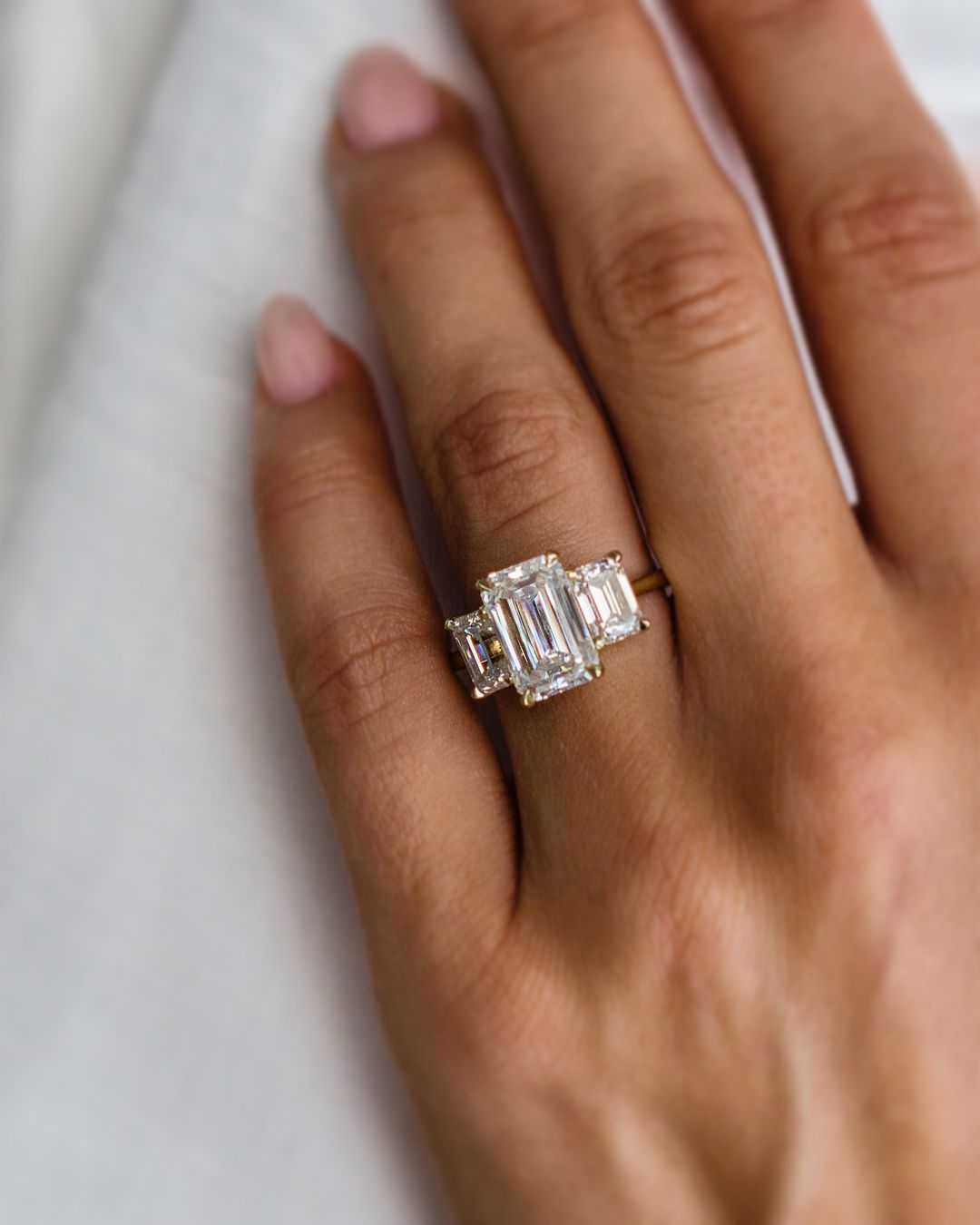 4.50ctw Emerald Cut Three stone Engagement Ring