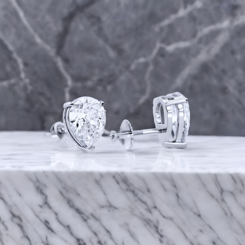 2 Carat Pear Cut Lab Grown Diamond Stud Earrings • 14K Gold Basket Setting