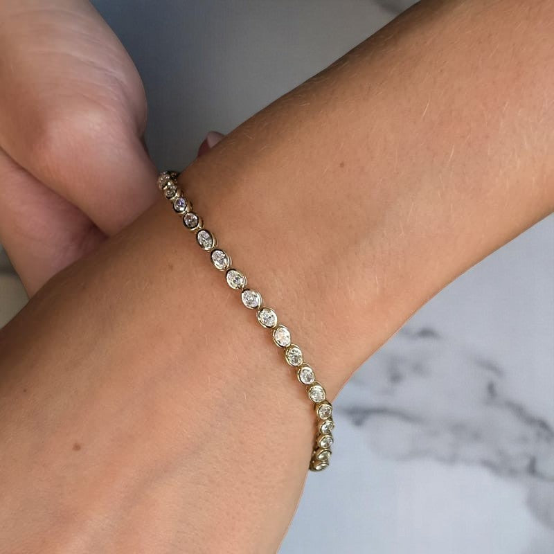 6.00 ct Oval Shape Lab Grown  Diamond Tennis Bracelet, Bezel Set in 14K Rose Gold